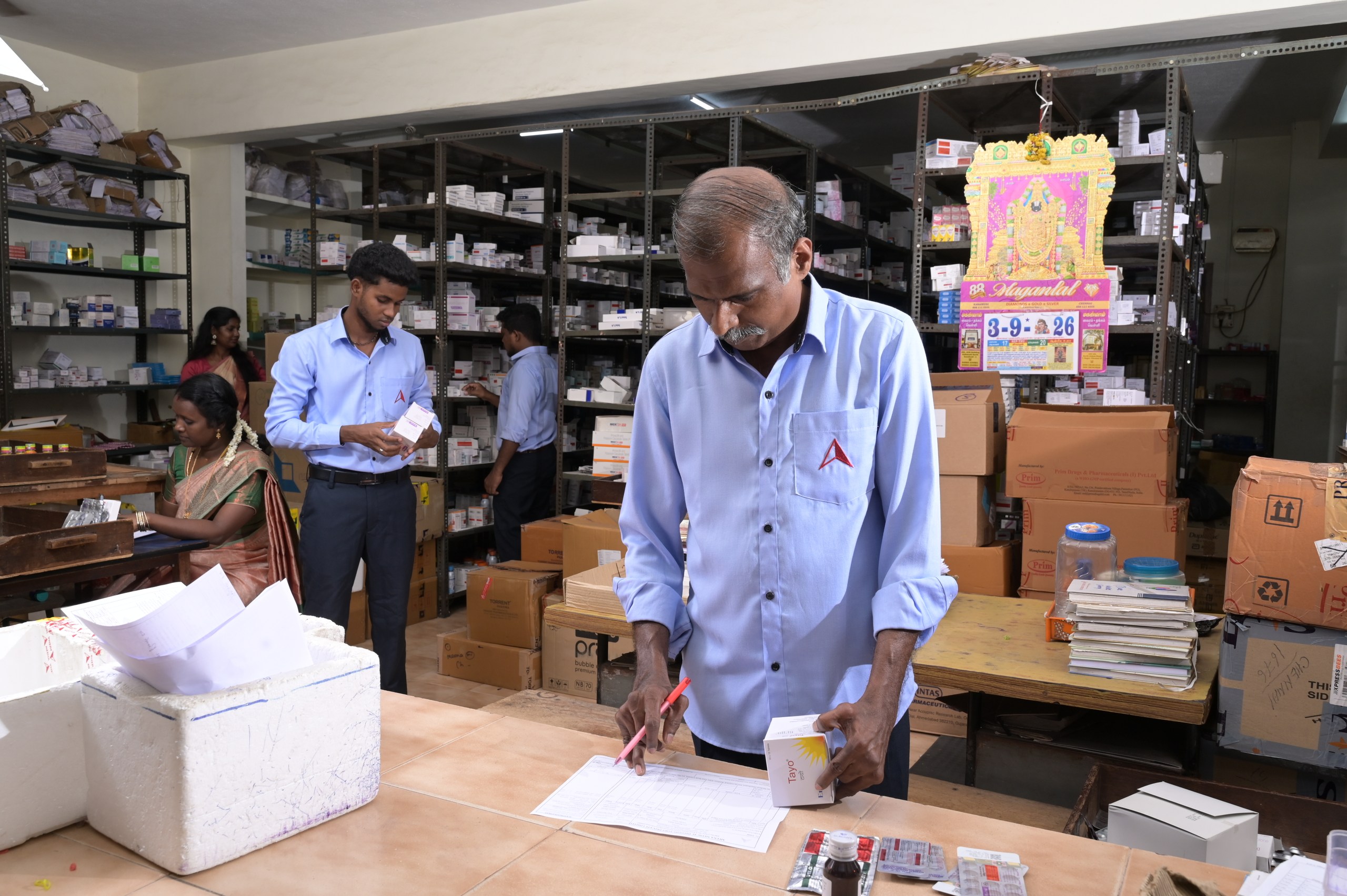Pharmaceutical distribution team at work